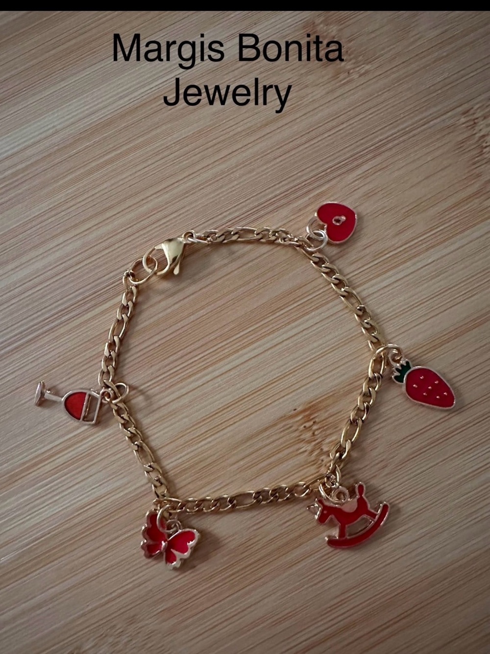 Margis Bonita Gold Charm Bracelet with Red Enamel Accents